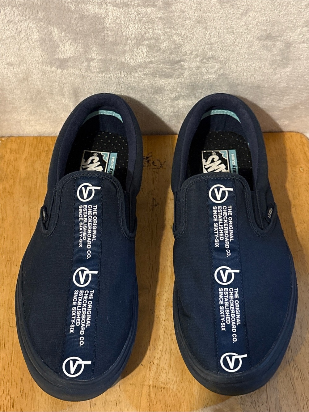 Vans Navy Slip-On Loafers with White Logo Tape